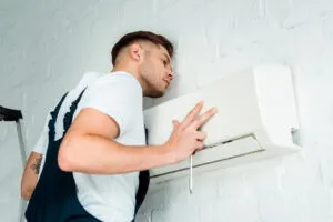 rsz handsome worker installing air conditioner 2023 11 27 05 30 43 utc 300x200 1