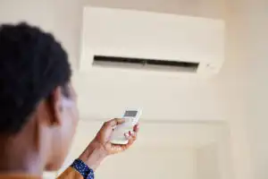 rsz african american woman holding remote control aime 2023 11 27 04 52 19 utc 300x200 1