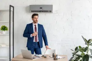 rsz handsome businessman holding glass of water while 2023 11 27 05 30 21 utc 300x200 1
